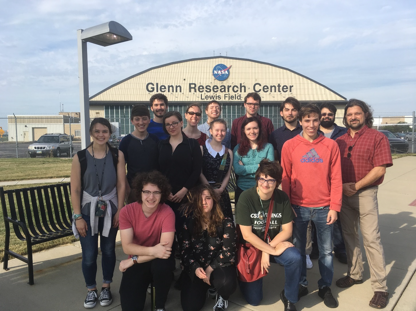 REU and Cleveland State Students and CSU Faculty in front of the NASA Glenn Research Center Welcome Center.
