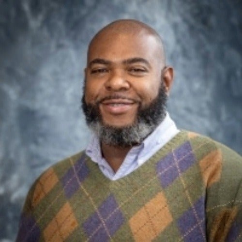 A headshot of Claude Brown