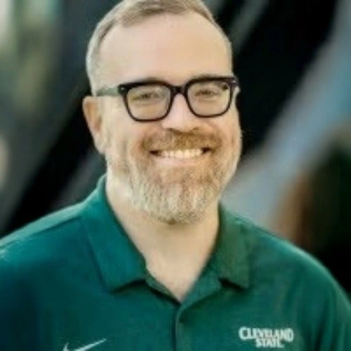 A headshot of Dr. Eric Allard