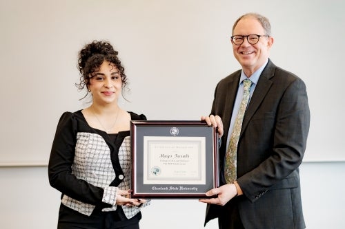 A&S 2025 Fall Valedictorian Mays Turabi pictured with Dean Andy Kersten