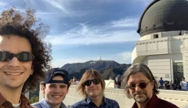 APS Group picture outside of an observatory