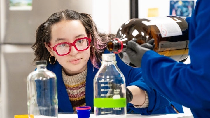 Student with goggles in Chemistry lab