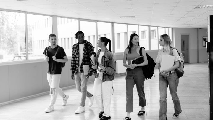 Women's and Gender Studies Image of Students walking down a hallway