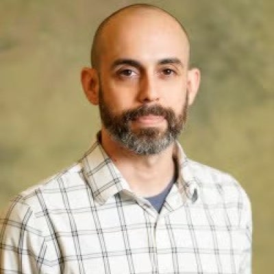 A headshot of Ilya Yaroslavsky