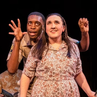 two actors performing