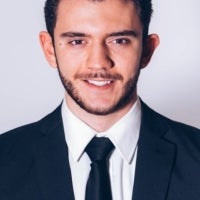 rocco in a suit