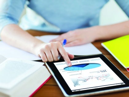 photo of working with statistics on an iPad