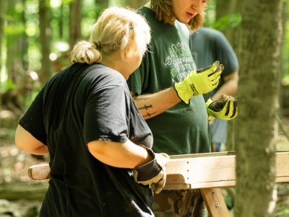 Anthropology Field School - Students Examining Find