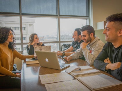 Middle Eastern students conversing