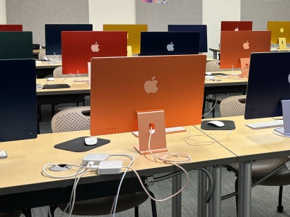 iMac computers in a design classroom.
